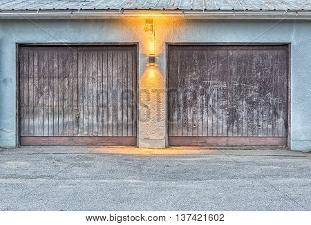 Pair of Garage Doors with a light between them.
