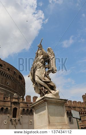 angel  statue of the Ancient bridge on Tiber river 