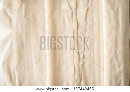 Filo dough sheets background horizontal close- up