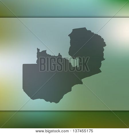 Blurred background with silhouette of Zambia. Zambia map.
