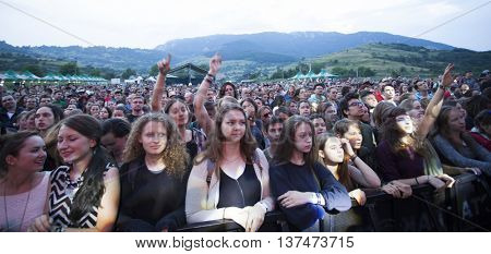 Rimetea (Torocko), Romania - July 3, 2016:Audience in front of the Main Stage at the Doublerise festival, the first multi art festival from Transylvania on July 3, 2016 
