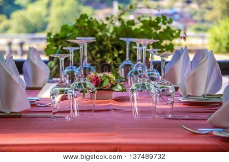 Solemnly Laid Table With Wine Glasses
