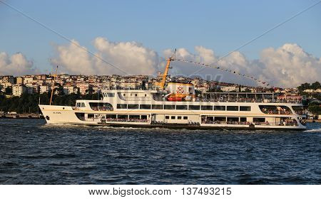 ISTANBUL TURKEY - JULY 06 2016: Sehir Hatlari ferry carry passengers between Asian side to European side of Istanbul. Sehir Hatlari was established in 1844 and now carries 150000 passengers a day.