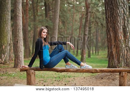 Beautiful Girl in a park look to camera