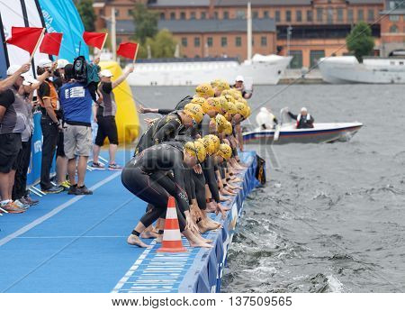 STOCKHOLM - JUL 02 2016: The female swimmers just before the start signal in the Women's ITU World Triathlon series event July 02 2016 in Stockholm Sweden