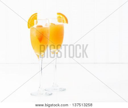 The cocktail known as a mimosa contains orange juice and champagne.