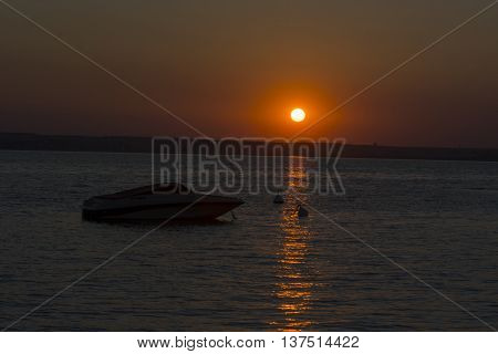 Sunset over Siutghiol lake during summer season