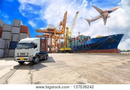 Ship for container with working crane bridge in shipyard with truck for Logistic Import Export background