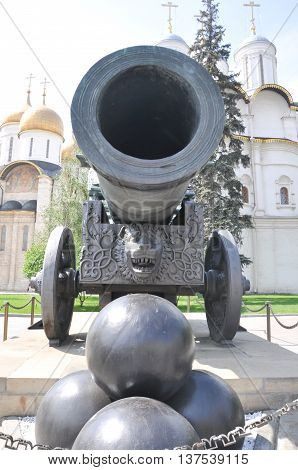 Historic cannon and balls in front of a church at the Kremlin