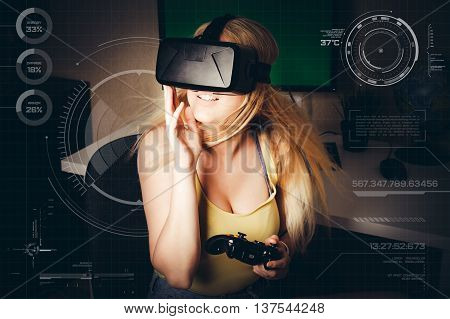 blonde girl playing and enjoy in virtual reality