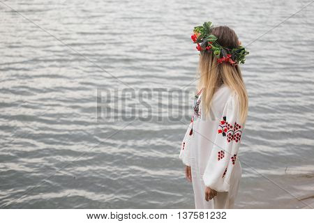 Young Happy Woman Wearing Tradisional Closes And Wreath