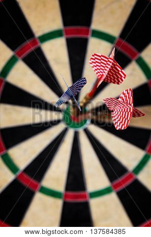 Dartboard With Steeldarts In Bullseye
