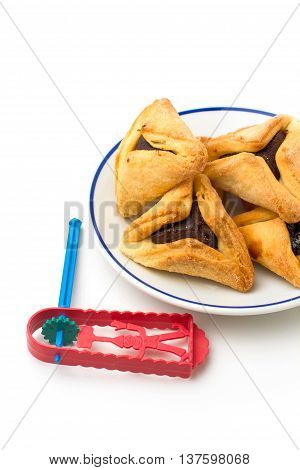 Hamantaschen cookies and grogger forJewish festival of Purim