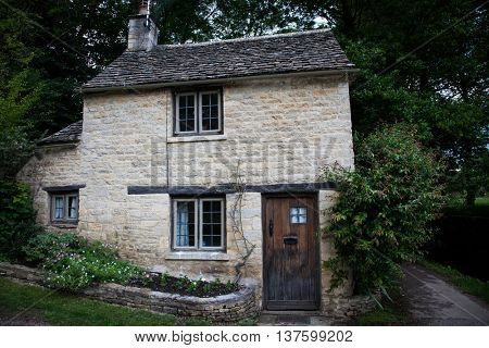 Traditional Cotswold cottages in England, UK. Bibury is a village and civil parish in Gloucestershire, England.
