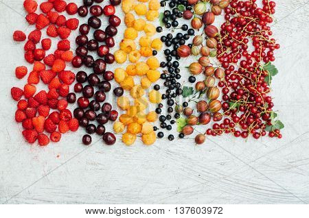 Colorful Mix Of Fruits On Black Background. View From Above. Fresh Organic Berries ,  So You Can Eat