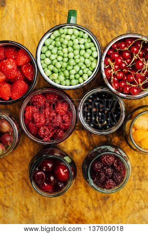 Colorful Mix Of Fruits On Black Background. View From Above. Fresh Organic Berries ,  So You Can Eat