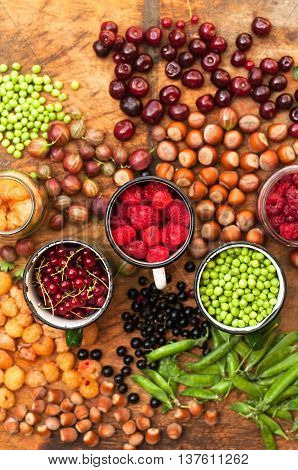 Colorful Mix Of Fruits On Black Background. View From Above. Fresh Organic Berries ,  So You Can Eat