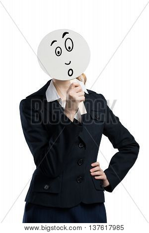 Businesswoman hiding her face behind round banner with sad smiley