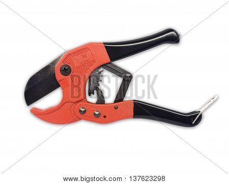 red scissors for cutting plastic pipe on white background.