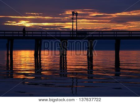 Sunset by the bridge at White Rock, Canada