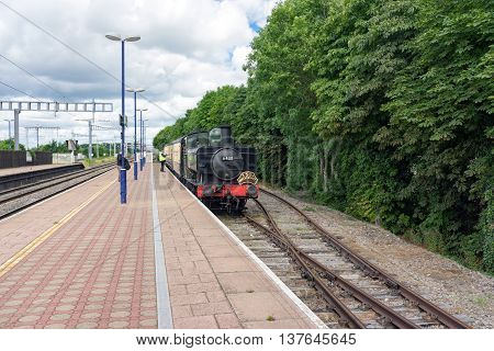 Cholsey/UK. 4th June 2016. A heritage service arrives into Cholsey station on the Great Western mainline.
