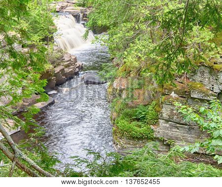 Canyon Falls on the Sturgeon River, in Canyon Falls Roadside Park, near Baraga, Michigan.