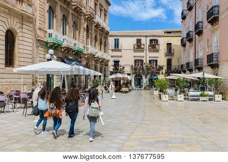 SIRACUSA ITALY - MAY 18: Young women shopping on May 18 2016 in Syracusa at the island Sicily Italy