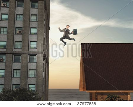 Young businessman move from country to city . Jumping from house to building.