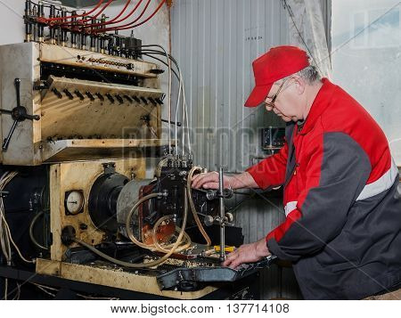 Professional Mechanics Testing Diesel Injector In His Workshop, Repair Of Diesel Fuel Injectors, Ust