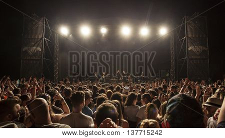 Rimetea (Torocko), Romania - July 2, 2016: Audience in front of the Main Stage at the Doublerise festival, the first multi art festival from Transylvania on July 2, 2016