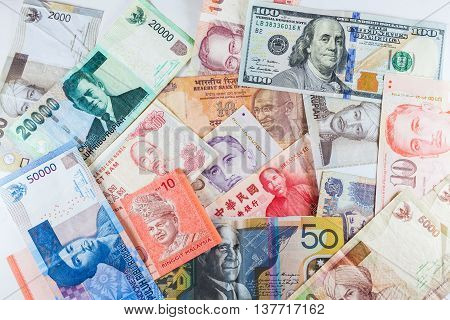 Multiple Currencies banknotes as colorful background showed the global money financial business economy crisis