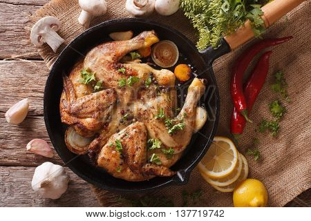 Hot Fried Chicken Tabaka With Ingredients Close-up. Horizontal Top View