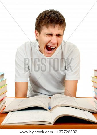 Tired Student Yawn on the School Desk Isolated on the White
