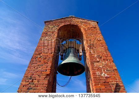 brick tower with bells ringing to tell the time