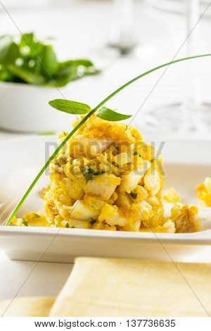 Cocochas (in basque kokotxas) refer to the flesh under a fish's jaw. Due to their high gelatinous content they make a fantastic broth. They are usually prepared with olive oil garlic and parsley.