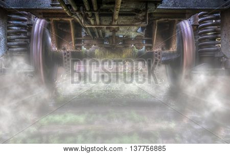 Under A Moving Train Composition Full Of Smoke And Motion
