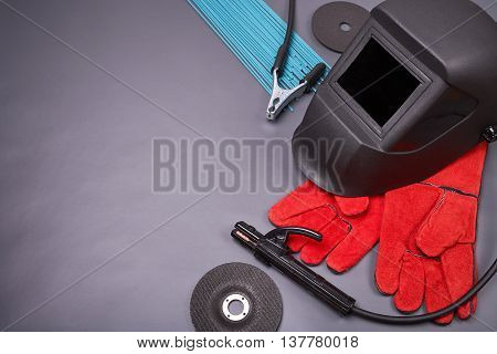 Welding equipment, welding mask, protective leather gloves, welding electrodes, high-voltage wires with clamps, cutting disc for grinder, set of accessories for arc welding.