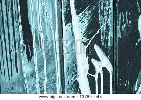 the spotty textured and indistinct abstract blue background