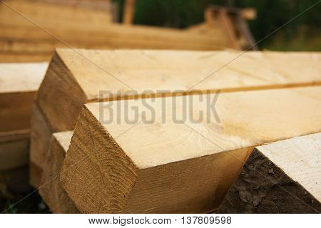 timber lumber laid on the street in summer