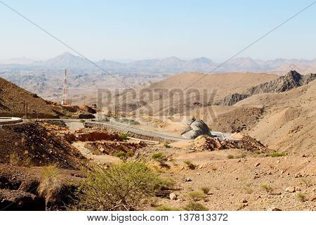 In Oman  The Old Mountain Gorge And Canyon The Deep Cloudy  Sky