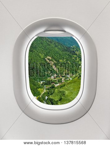 Looking Out The Window Of A Plane To The Village In Georgia