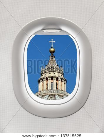 Looking Out The Window Of A Plane To The Basilica