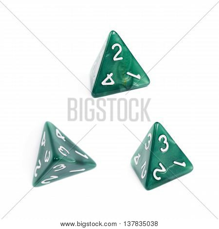 Green roleplaying polyhedral tetrahedron gaming plastic dice isolated over the white background, set of three different foreshortenings