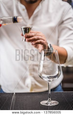 Bartender Pouring Liqueur