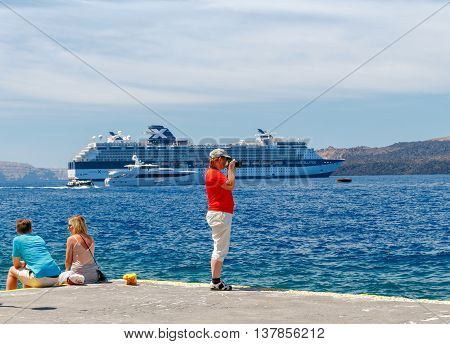 Fira Greece - May 1 2016: Embankment in the town of Fira on the island of Santorini. The Greek islands are one of the most visited tourist destinations in Europe.