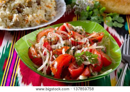 Fresh Salad With Tomatoes, Onions And Coriander - Achik-chuchuk. The Traditional Dish Of Uzbek Cuisi
