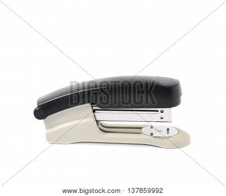 Black office stapler isolated over the white background