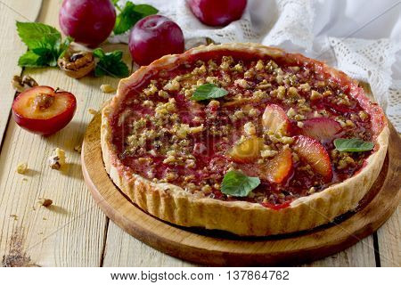 Plum Cake Shortbread Dough With Walnuts On A Table In A Rustic Style.