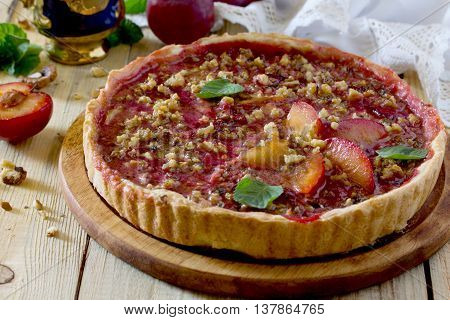 Plum Cake Shortbread Dough With Walnuts On A Table In A Rustic Style.