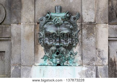 FONTAINEBLEAU, FRANCE - MAY 16, 2015: It is fragment one of the fountains in the Foutain Courtyard in chateau Fontainbleau.